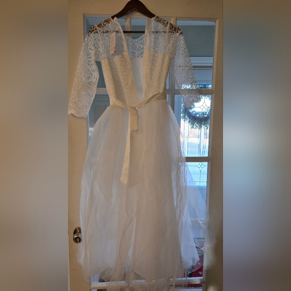 Ibtom Castle wedding/ party dress. Size small. Lace top, 3/4 sleeves. New. - Picture 7 of 8